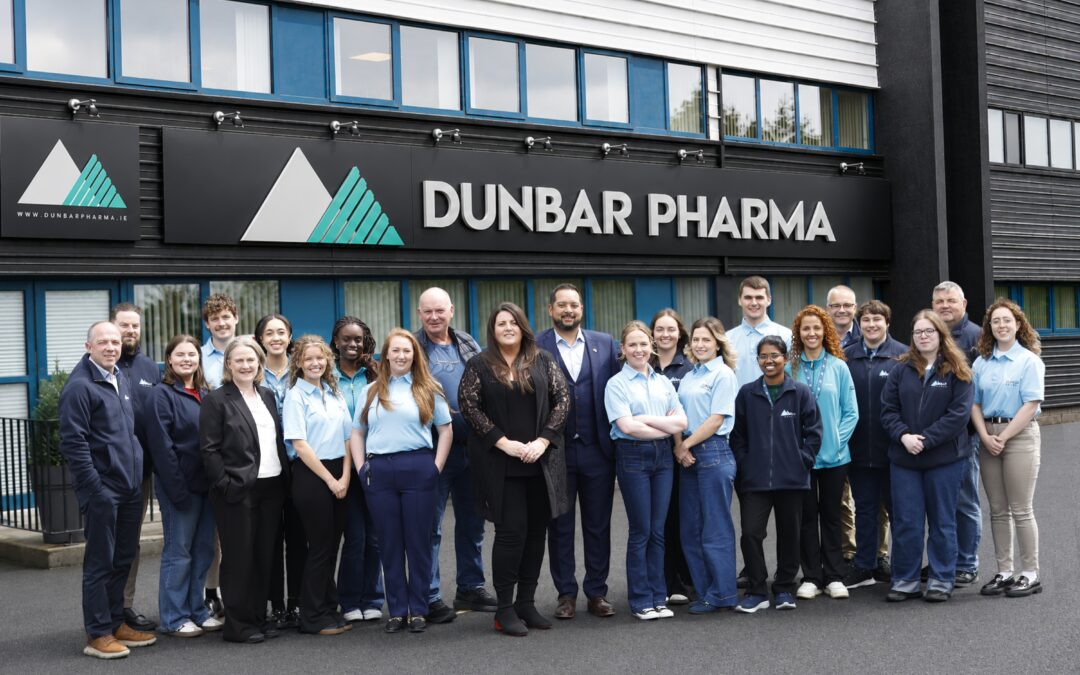 Dunbar Pharma CEO Leah Fletcher with the Dunbar Pharma team outside the company’s pharmaceutical manufacturing facility in Ireland.